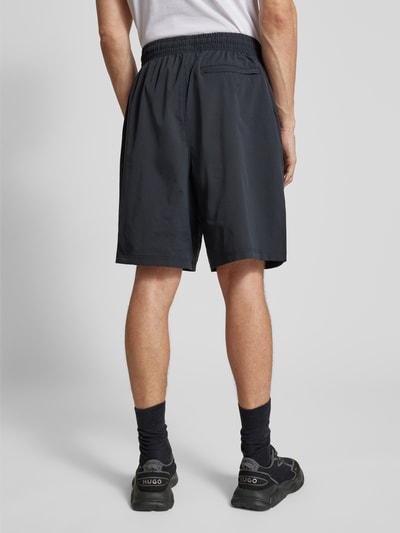 Under Armour Relaxed Fit Shorts mit Reißverschlusstaschen Modell 'Unstoppable' Black 5