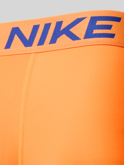 Produktfoto, Pant & Trunk mit Label-Schriftzug im 3er-Pack von Nike w kolorze pomarańczowym, faktura gładka