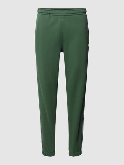 Lacoste Sweatpants mit Label-Streifen Modell 'TAPE' Gruen 2