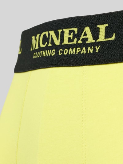 Produktfoto, gelber Slim Fit Trunk mit schwarzem, elastischem Bund und gelbem MCNEAL-Logo-Detail, Baumwoll-Mix, 5er-Pack