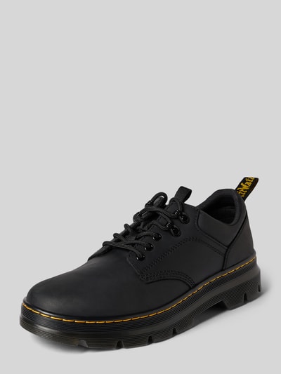 Produktfoto, schwarze Schuhe aus echtem Leder Modell 'Reeder' von Dr. Martens mit Schnürverschluss, profilierter Sohle und gelber Naht, abgerundete Passform, Größe 44: Absatzhöhe 5 cm, Schafthöhe 7 cm, Schaftweite 8 cm.