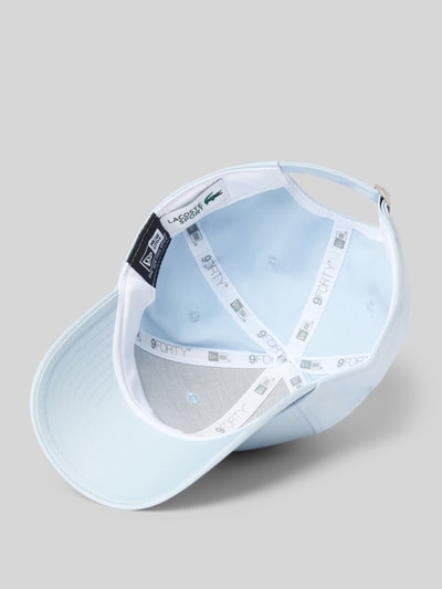 Produktfoto, Basecap aus reiner Baumwolle von Lacoste in Hellblau, unifarben mit Label Patch, Ösen, Nähten und verstellbarem Riegel