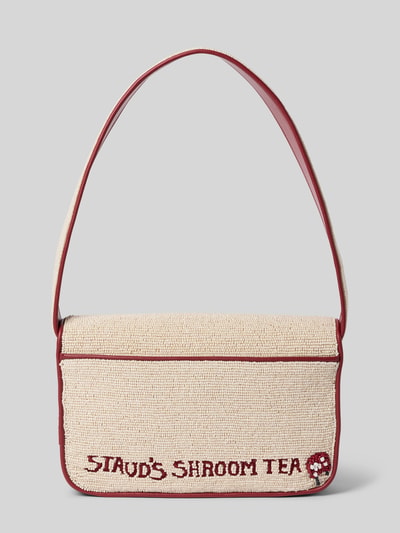 Produktfoto, cremefarbene Handtasche mit Ziersteinbesatz Modell 'Tommy' von Staud, florales Design, Überschlag, roter Schriftzug, Maße 26x16x5 cm, Schulterriemen 64 cm, Magnetverschluss