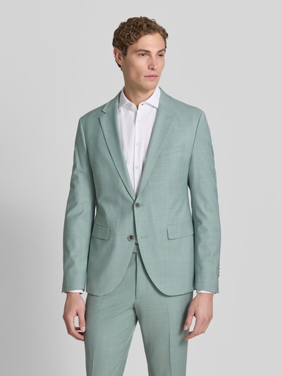 Männermodel trägt Slim Fit 2-Knopf-Sakko mit Pattentaschen Modell 'Monopoly' von CINQUE in Mint, Material-Mix mit Schafswoll-Anteil, Ganzkörperansicht von vorne. Rückenlänge bei Größe 50: 73 cm, Schulterbreite: 41 cm, Ärmellänge: 65 cm.
