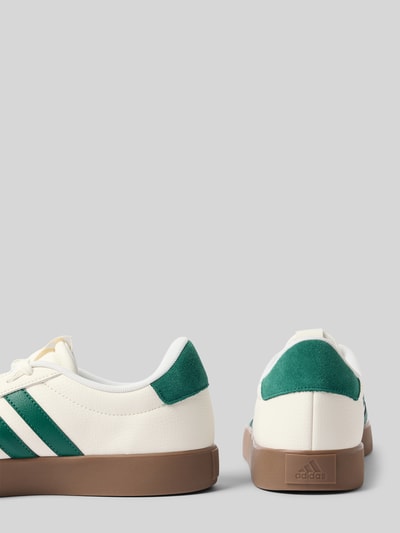 Produktfoto, Sneaker mit Schnürverschluss von adidas Sportswear aus Leder-Mix mit abgerundeter Spitze, Label-Detail, strukturierte Sohle, Absatzhöhe 3 cm, Schafthöhe 8 cm, Schaftweite 6 cm, grün-weiß-braune Farbkombination