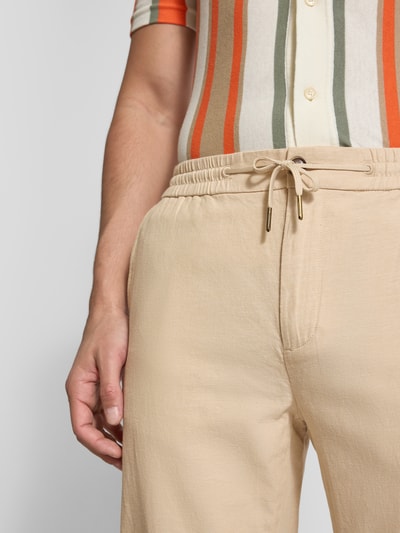 Scotch & Soda Spodnie materiałowe o kroju tapered fit z tunelem model ‘Warren’ Beżowy 3