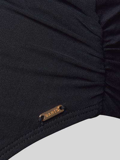 Produktfoto, czarne figi bikini z wysokim stanem High Waist Bikini-Slip mit Label-Detail Modell 'SOLID' od Barts, mieszanka materiałów z dodatkiem streczu, detal z logo