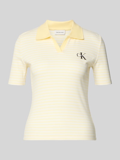Produktfoto, Slim Fit Poloshirt mit Label-Stitching von Calvin Klein Jeans im zarten Gelb, Baumwoll-Elasthan-Mix, Ripp-Optik, V-Ausschnitt