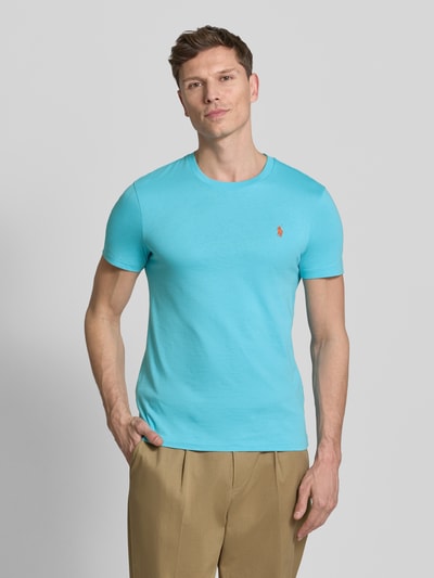 Mannenmodel draagt Regular Fit T-Shirt aus reiner Baumwolle van Polo Ralph Lauren, effen turquoise, logo-stitching, ronde hals, korte mouw, jersey katoen, vooraanzicht bovenlichaam.