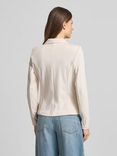 Frauenmodel trägt Regular Fit Strickjacke mit Reißverschluss von Polo Ralph Lauren aus bawełna, krój regular fit, kaptur, tunel, zamek błyskawiczny, wyhaftowane logo, wpuszczane kieszenie, prążkowane wykończenia, długość tyłu w rozmiarze S 51 cm, szerokość w rozmiarze S 58 cm, długość rękawów w rozmiarze S 60 cm, jasny kolor, gładka faktura, proste szwy, Ganzkörperansicht Rückansicht.