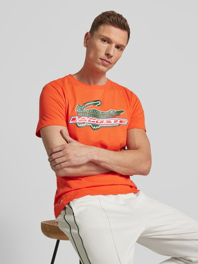 Lacoste T-shirt z nadrukiem z logo Pomarańczowy 3