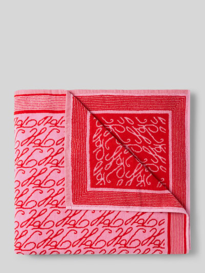 Produktfoto, Handtuch aus reiner Baumwolle Modell 'SCRIPT TOWEL' von TOMMY HILFIGER, Optik: Allover-Muster, Logo-Print, Frottee-Struktur, in Rot und Rosa.
