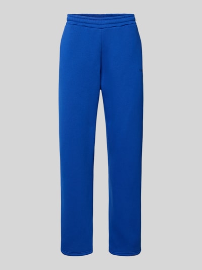 Produktfoto, sweatpants met elastische band van REVIEW, materiaalmix met katoen, relaxed fit, achterzak, binnenbeenlengte maat M 76 cm, blauw