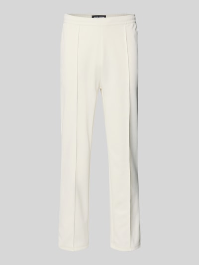 Produktfoto, cremefarbene Trackpants mit Längsnähten Modell 'Motus' von Pegador im Material-Mix mit Baumwoll-Anteil, Relaxed-Fit, elastischer Bund, Herren, Innenbeinlänge 75 cm bei Größe M.