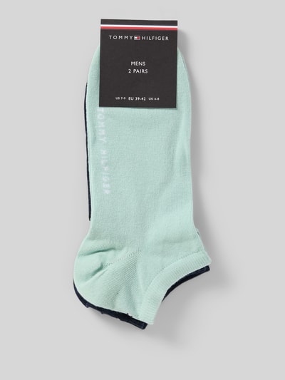 Produktfoto, Socken aus Baumwoll-Mix im 2er-Pack von Tommy Hilfiger in Mintgrün und Dunkelblau, unifarben, Label Print, Feinstricktextur.