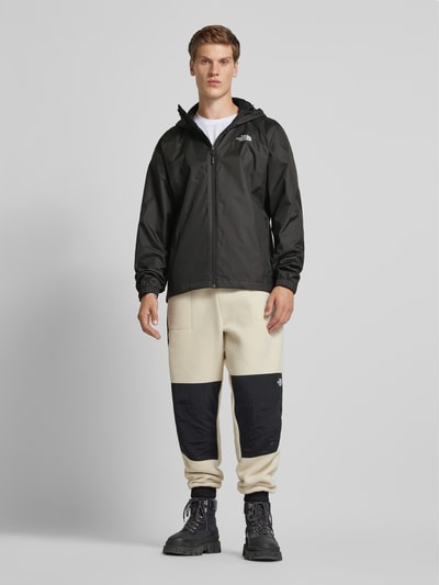 The North Face Windbreaker met labelprint, model 'QUEST' Zwart - 1