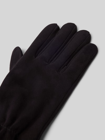 Produktfoto, schwarze Handschuhe aus echtem Leder Modell 'Strassburg' von Roeckl mit feinem Strukturmuster und Logo-Detail auf grauem Hintergrund.