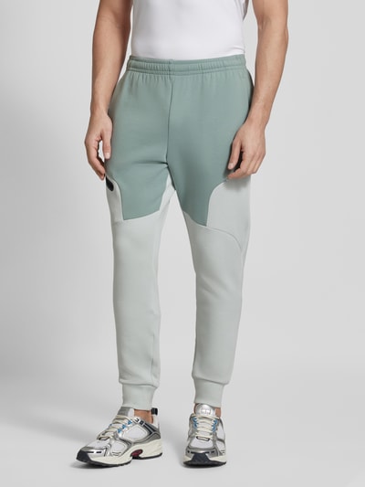 Under Armour Relaxed Fit Sweatpants mit Logo-Print Modell 'Unstoppable' Mint 4