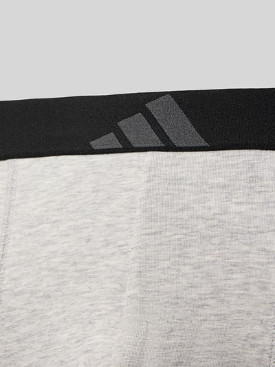 Produktfoto, Trunks aus Baumwoll-Mix im 5er-Pack von adidas Sportswear mit Optik: Unifarben, Logo-Print, elastischem Bundabschluss, Jersey-Stretch Materialverarbeitung, detailreiche Nahaufnahme der Stoffstruktur.