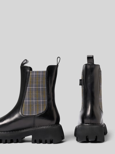 Produktfoto, Stiefel aus echtem Leder mit Logo-Detail von Marc Cain Bags & Shoes, schwarz mit Muster, profilierte 6 cm Sohle, Schafthöhe 19 cm, Schaftweite 12 cm, abgerundete Passform