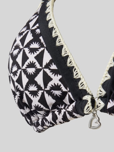 Produktfoto, Bikini mit Neckholder Modell 'BLUCOSTORA' von Banana Moon, czarno-biały wzór geometryczny, detal z logo, materiał z domieszką stretchu