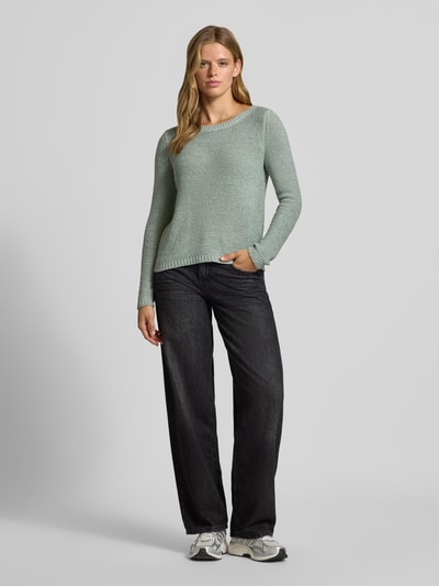Vrouwenmodel draagt donkere loose fit jeans van katoendenim, Loose Fit Jeans uit pure katoen model 'TOLEDO' van ONLY, dames Wide & loose fit jeans, volledige vooraanzicht.