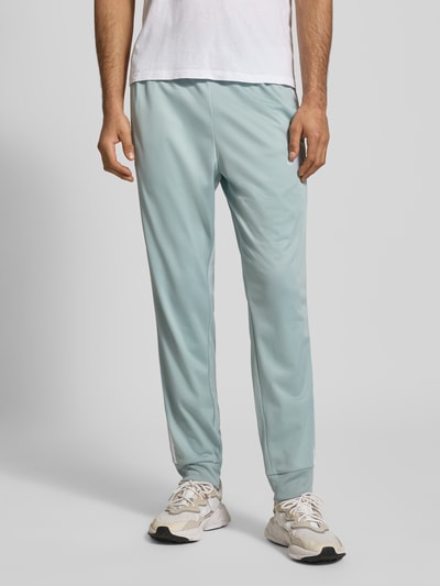 adidas Sportswear Spodnie dresowe w kroju slim fit z haftowanym logo Miętowy 4