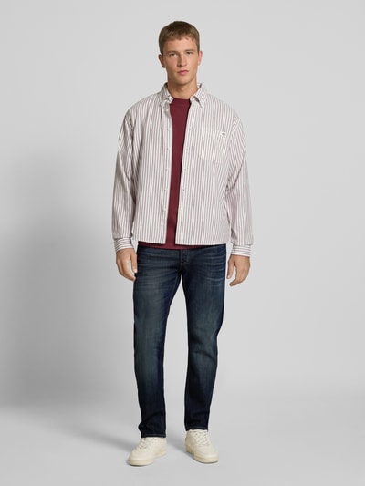 JACK & JONES Jeansy o kroju tapered fit z wpuszczanymi kieszeniami model ‘MIKE’ Ciemnoniebieski 1