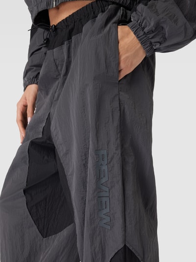 Review Parachute Tracksuit Pants aus Nylon Two-Toned Black 3