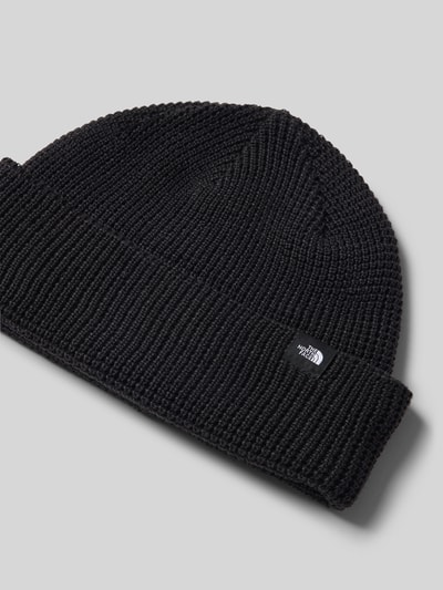 Produktfoto, Beanie mit Label-Patch Modell 'FISHERMAN' von The North Face, schwarze Strick-Optik mit Strukturmuster, Herrenaccessoire