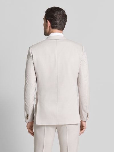 Männermodel trägt Slim Fit Komplettanzug mit Klepzakken van Roy Robson in licht beige Materiaalmix met scheerwol, ganzlichaamsaanzicht achteraan