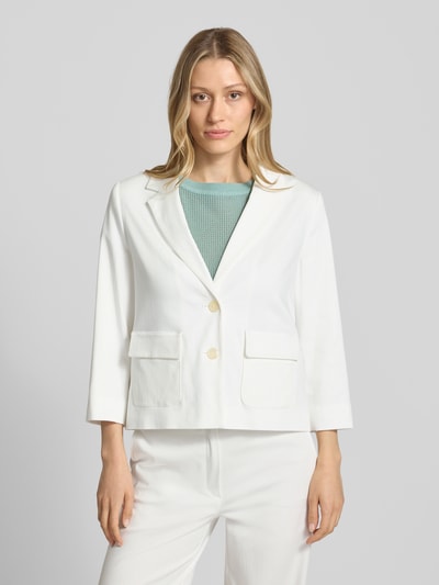 Frauenmodel trägt Regular Fit Blazer mit Pattentaschen und 3/4-Arm von Betty Barclay, Viskose-Anteil, Reverskragen, Knopfverschluss, Nahaufnahme Oberkörper.