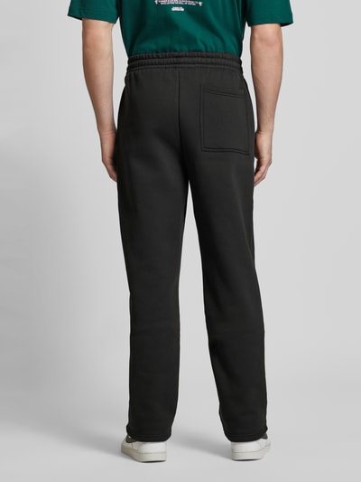 Multiply Apparel Spodnie dresowe o kroju regular fit z nadrukiem z logo Czarny 5
