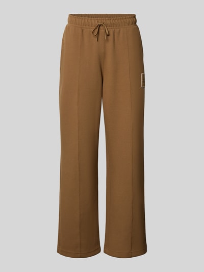 Produktfoto, bruine loose fit sweathose uit katoenmix model 'Tenn' van Lacoste, heren sweathose, effen, zachte structuur