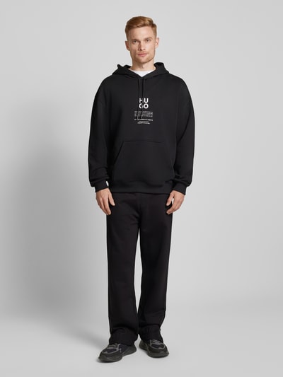 HUGO Sweatpants met elastische band, model ‘Detechtros’ Zwart - 1