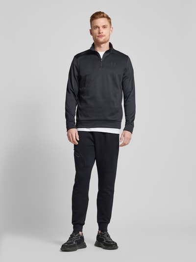 Under Armour Regular fit sweatpants met ritszak, model 'UNSTOPPABLE' Zwart - 1