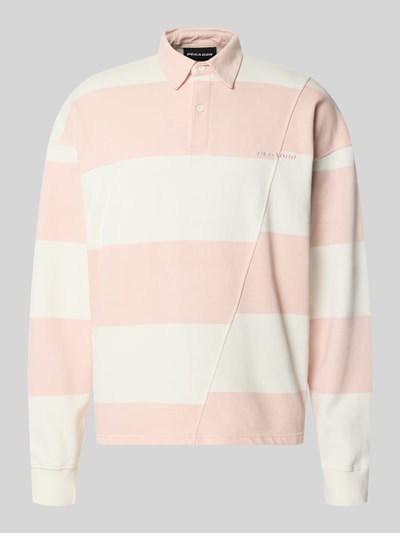 Produktfoto, Relaxed Fit Poloshirt aus reiner Baumwolle Modell 'Castelluccio' von Pegador, kremowo-różowe szerokie pasy, bawełna, kołnierzyk polo z listwą guzikową, prążkowane mankiety, przeszycie z logo, obniżone ramiona, długość tylu w rozmiarze M: 69 cm