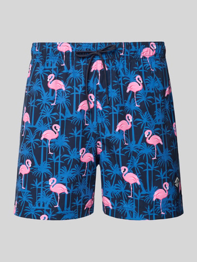 Productfoto, Badehose im Allover-Look Modell 'MAUI VIBES NOVELTY' van Jack & Jones, regular fit, elastische tailleband, donkerblauw met roze flamingo’s en blauwe palmboomprint, gladde textuur