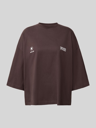 Produktfoto, Oversized T-Shirt mit Rundhalsausschnitt von Karo Kauer, damski t-shirt, bawełna, krój oversized, nadruk z logo, długość tyłu w rozmiarze S 59 cm