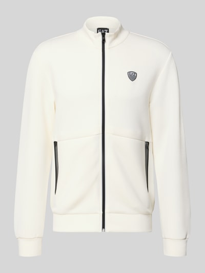 Produktfoto, Sweatjacke mit Reißverschluss von EA7 Emporio Armani in Creme mit schwarzem Zipper, Stehkragen, gerippten Abschlüssen, Label-Detail.