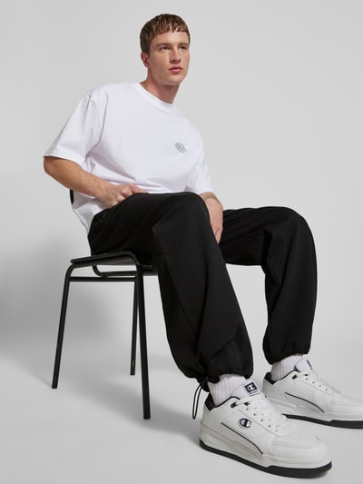 REVIEW Baggy fit sweatpants met steekzakken opzij Zwart - 3