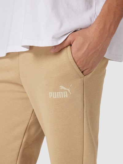 PUMA PERFORMANCE Spodnie dresowe z nadrukiem z logo Beżowy 3