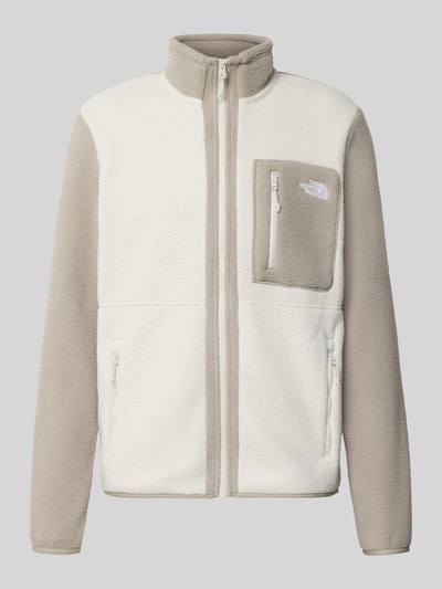 Produktfoto, kurtka z polaru z stójką Model 'YUMIORI' od The North Face, luźny krój, kieszenie zapinane na zamek błyskawiczny, długość tyłu w rozmiarze M 71 cm, długość rękawów w rozmiarze M 71 cm, elastyczne wykończenia, jasnoszare i białe kolory, tekstura miękka