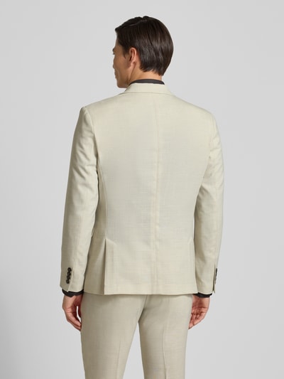 Männermodel trägt Slim Fit Anzugsakko mit Woll-Anteil Modell 'SLIM-OASIS' von SELECTED HOMME in Melange-Optik, Ganzkörperansicht Rückansicht