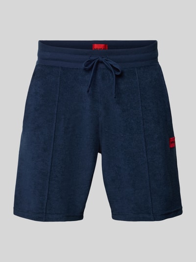 Produktfoto, Regular Fit Sweatshorts aus Baumwoll-Mix Modell 'TERRANCE' von HUGO in Dunkelblau, Optik: Unifarben, Label-Patch, elastischer Bundabschluss mit Tunnelzug, seitliche Eingrifftaschen, Materialverarbeitung: Sweat