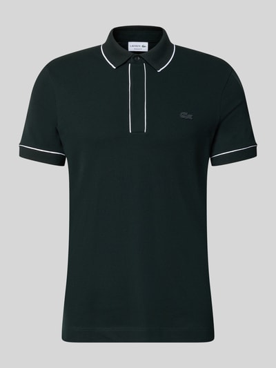Produktfoto, Regular Fit Poloshirt aus Baumwoll-Mix Modell 'CHEMISE' von Lacoste in Dunkelgrün mit weißen Akzenten auf grauem Hintergrund. Herren Poloshirt von Lacoste.