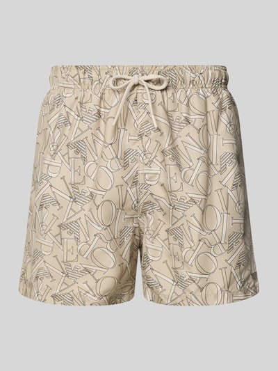 Produktfoto, Regular Fit Shorts mit Allover-Logo-Print von Emporio Armani in Beige mit elastischem Bund und Tunnelzug, grafische Muster, glatte Textur.