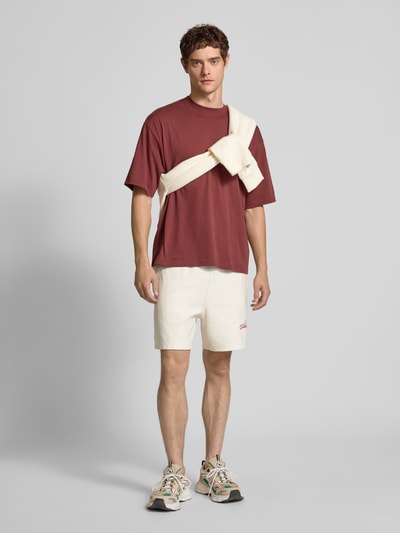 Calvin Klein Jeans Regular Fit Sweatshorts mit Logo-Stitching Modell 'Terry' Offwhite 1