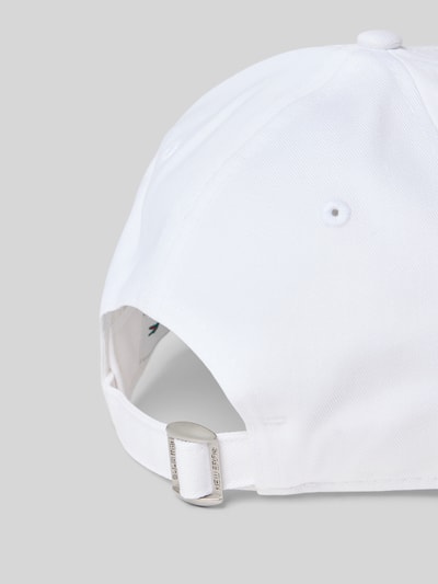 Produktfoto, Basecap aus reiner Baumwolle von Lacoste in Weiß, unifarbene Optik, Label Patch, Ösen, Nähte, verstellbarer Riegel, Webware