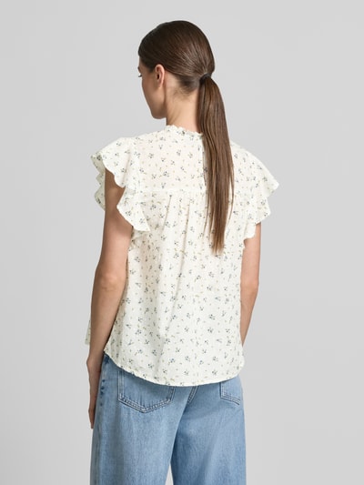 Kobiece modelka nosi Regular Fit Blusentop aus reiner Baumwolle Modell 'TRINE' od Vero Moda, kremowy w kropki, popelina, widok całej sylwetki z tyłu.